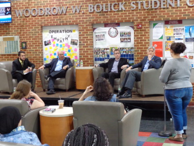 Town Hall Meeting Panel Listening to a Question by Charles Stish