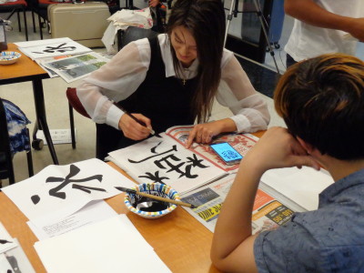 PVCC students practicing calligraphy