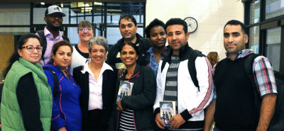 Christine Darden posing with Kathryn St. Clair and herESL students. Photo by PVCC Marketing and Media 