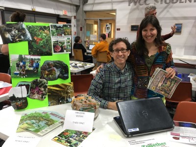 David Lerman poses with a student at the club day table