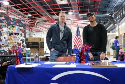David Troyer and Branson Hernandez at the club day table 