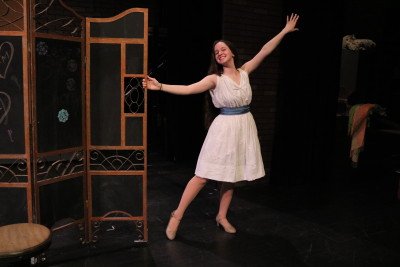 Anya Risner, who plays Maria, poses after singing “I Feel Pretty.” Photography by Madison Weikle 