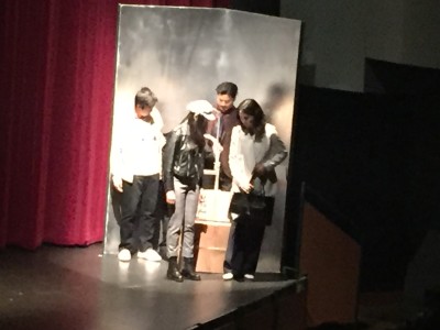 The cast standing on stage. Phto by Tyler Gaines.