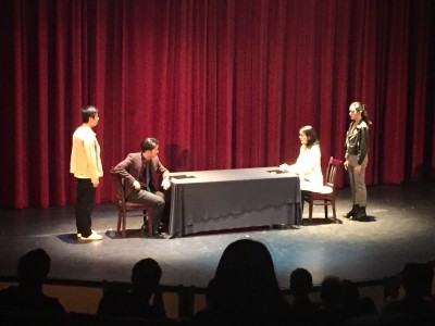 Cast at the negotiation table. Photography by Tyler Gaines.