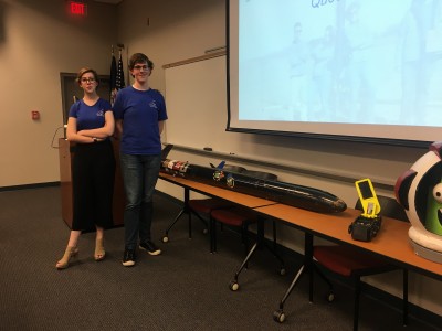 Jesse and Andew Oxford pose with the Launch Team's Rocket. Photography by Madison Weikle