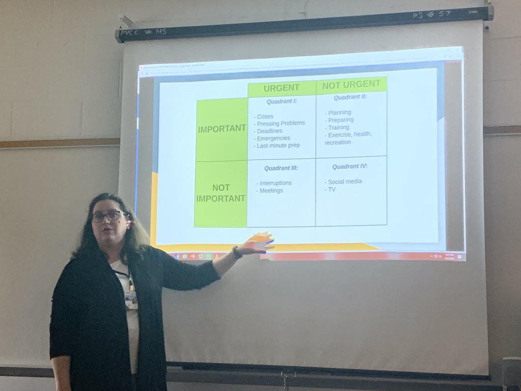 Adjunct instructor, Sarah Surratt gestures to a chart during the workshop.
