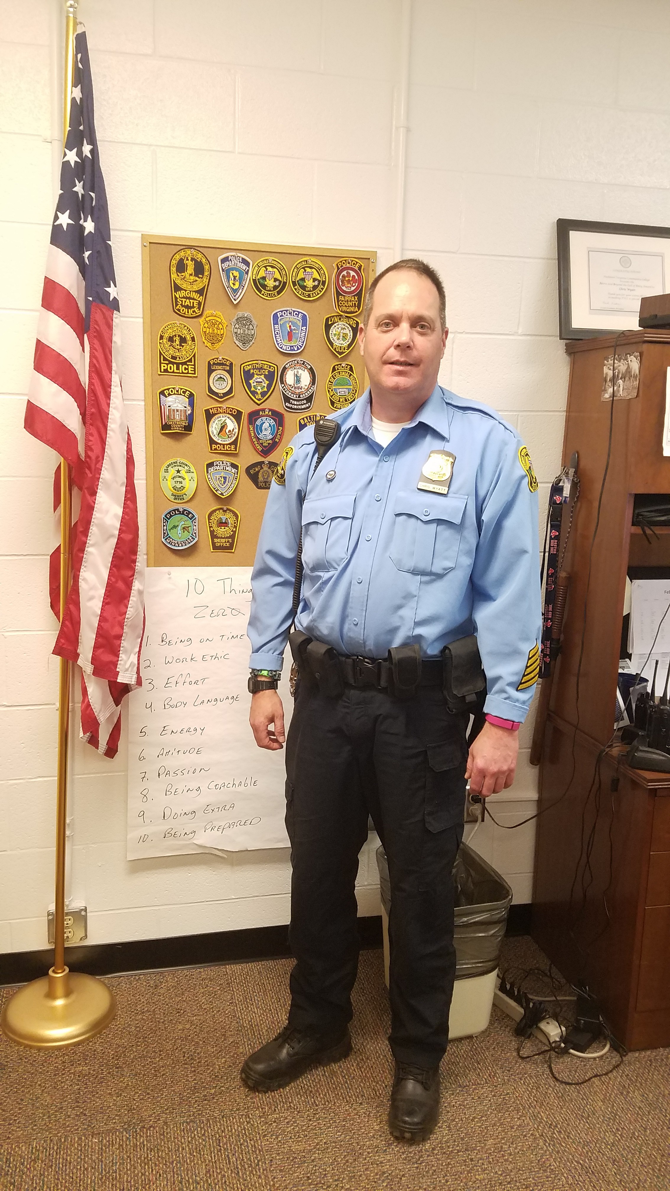 Chief Chris Wyatt posing for a photo by Marlie Soderquist