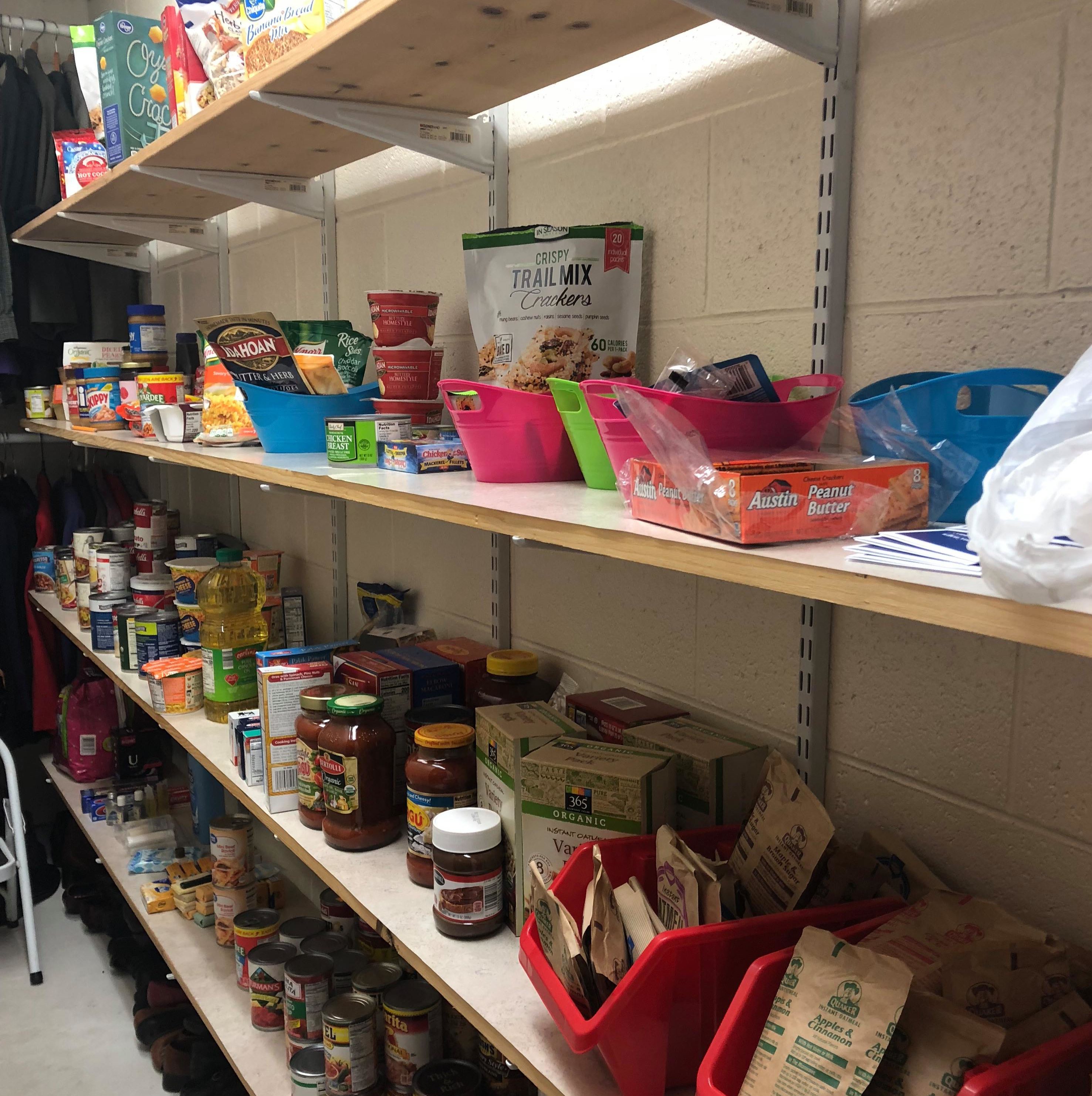 the inside of the pantry with food items on shelves