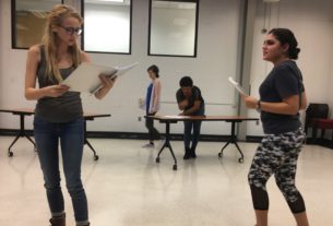 Madison Weikle and Ana Lorenza rehearse a scene in the North Mall Meeting room.