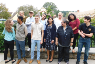 Students pose in silly ways outside