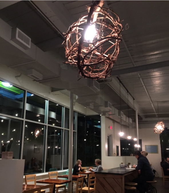 a picture of a lighting fixture inside of Brazos Tacos