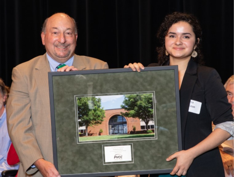 Dr. Frank Friedman awarding Sophia Keniston