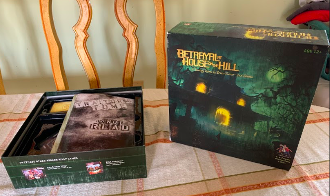 A board game by Bruce Glassco. What starts off as a cooperative exploration of a haunted house goes awry when one of the players turns traitor. Photography by Jude Bolick