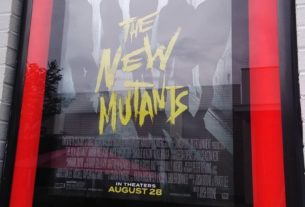 the movie poster for The New Mutants outside a movie theater