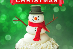 A snowman sits atop a cupcake with a clock inside it as the Sugar Rush Christmas logo looms overhead