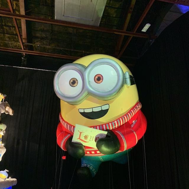 A Bob the Minion balloon gives an open mouthed grin to the camera