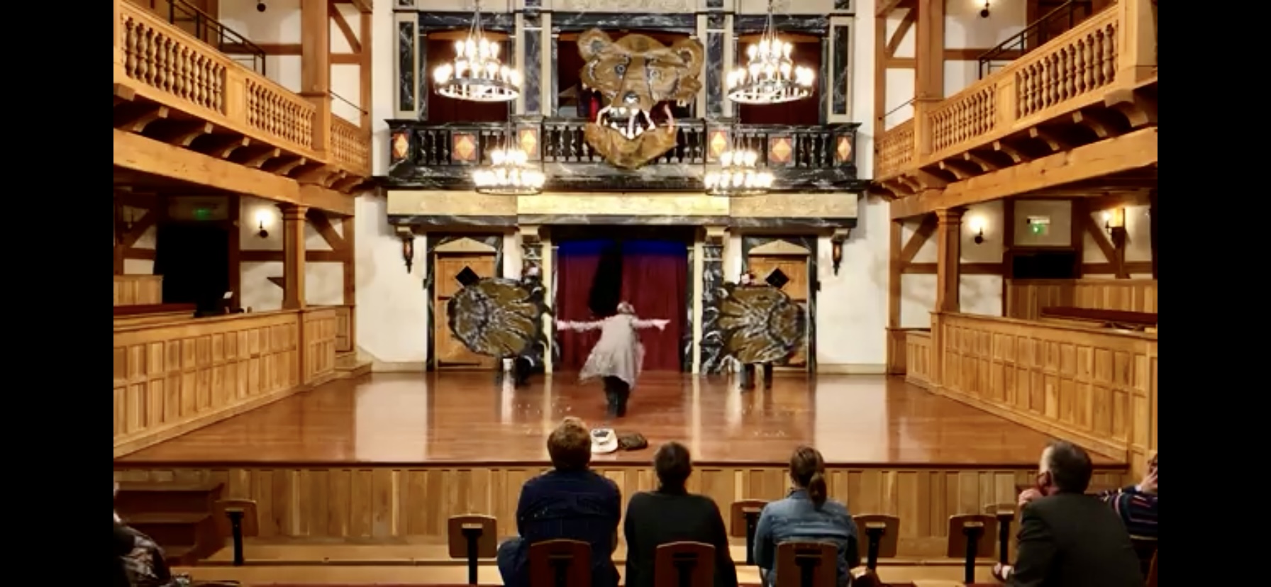 View of the Blackfriars Playhouse stage showing student actors using their paper mache bear prop.