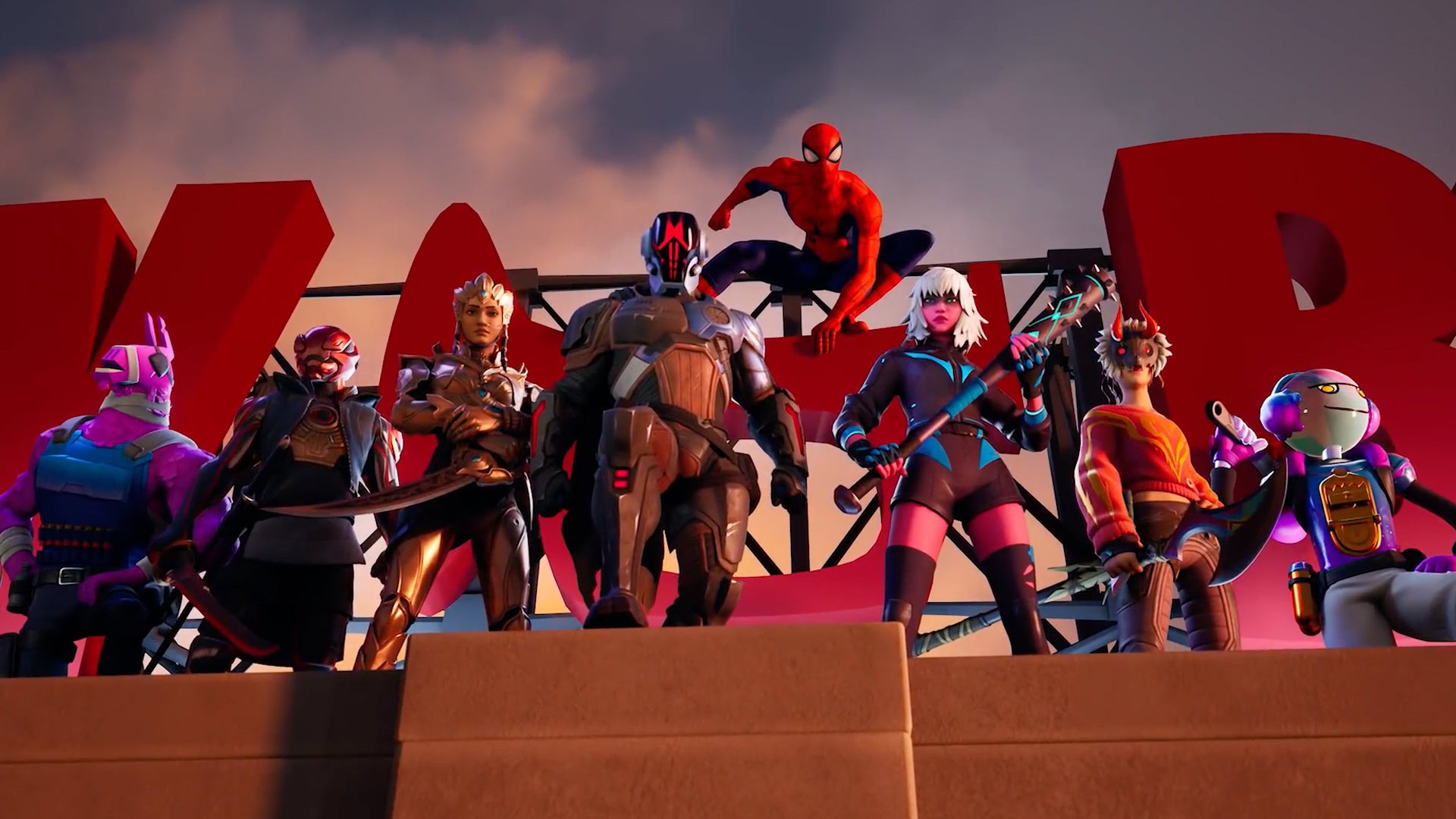 eight different vibrant and colorful characters, including Spider Man, stand atop a large industrial building in front of a light up sign, looking down at the camera