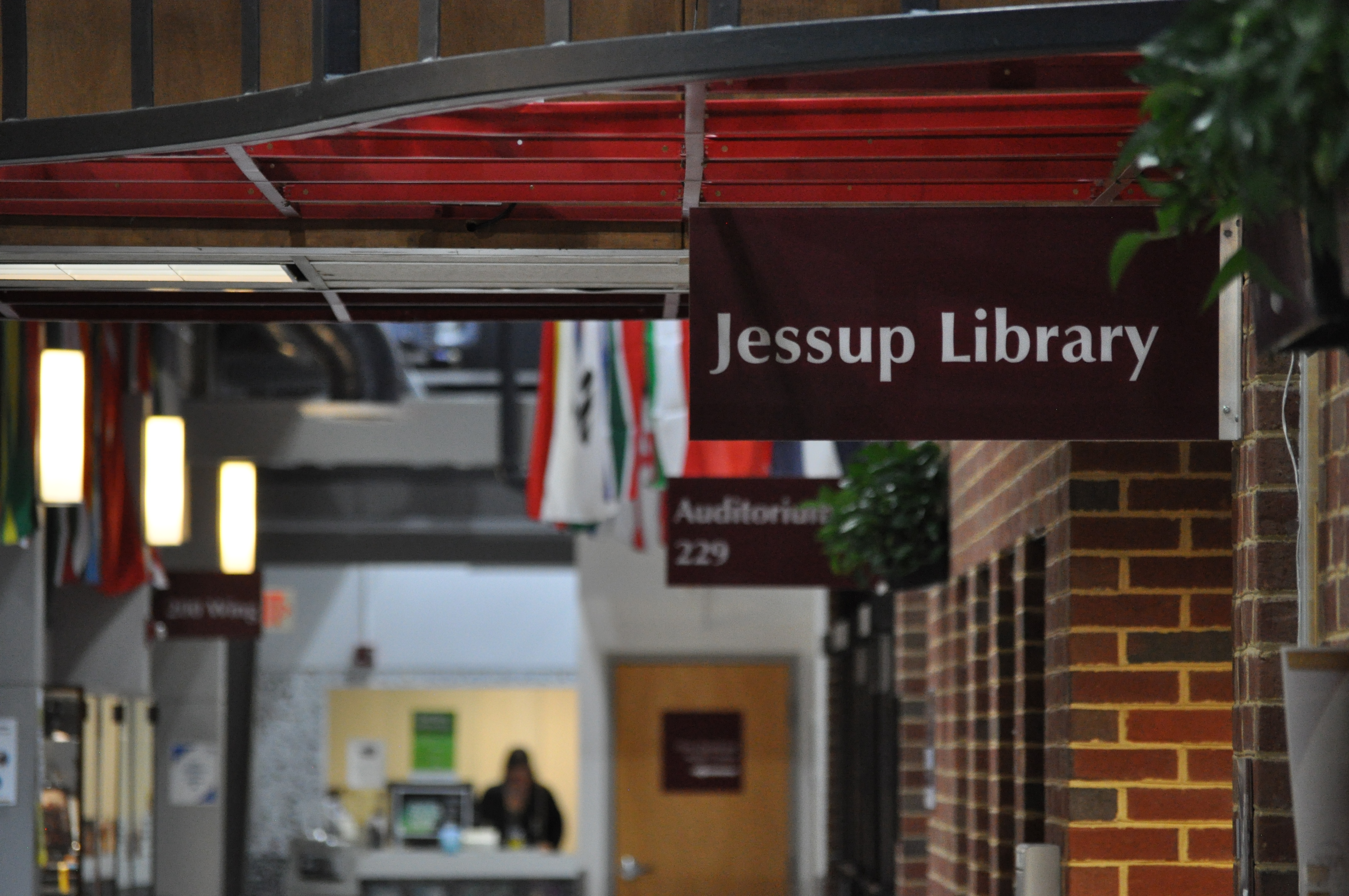 A photo of the couridor outside the PVCC library and the Jessup Library sign.