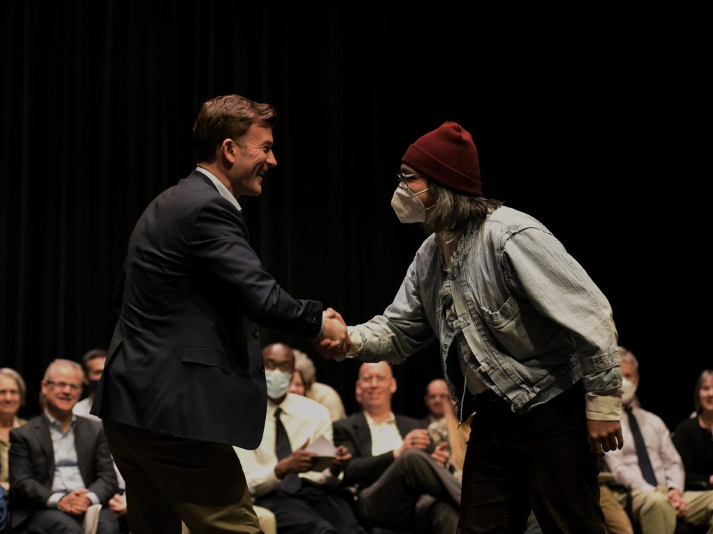 Andrew Renshaw shakes Carlos Banda Montes hand