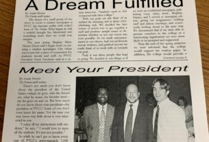 The front page of the school newspaper. It says "The Forum" at the top, with two articles below and a picture of three men.