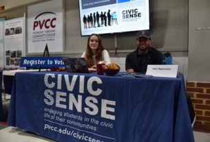 Students at PVCC encouraging other students to register to vote by providing laptops.