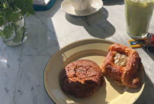 Table at Cou Cou Rachou with croissant aux amandes (behind), miso chocolate chip cookie, croissant aux oignons and iced matcha (left to right).