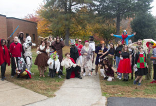 All of the Halloween Costume Competition contestants posing for a group photo.