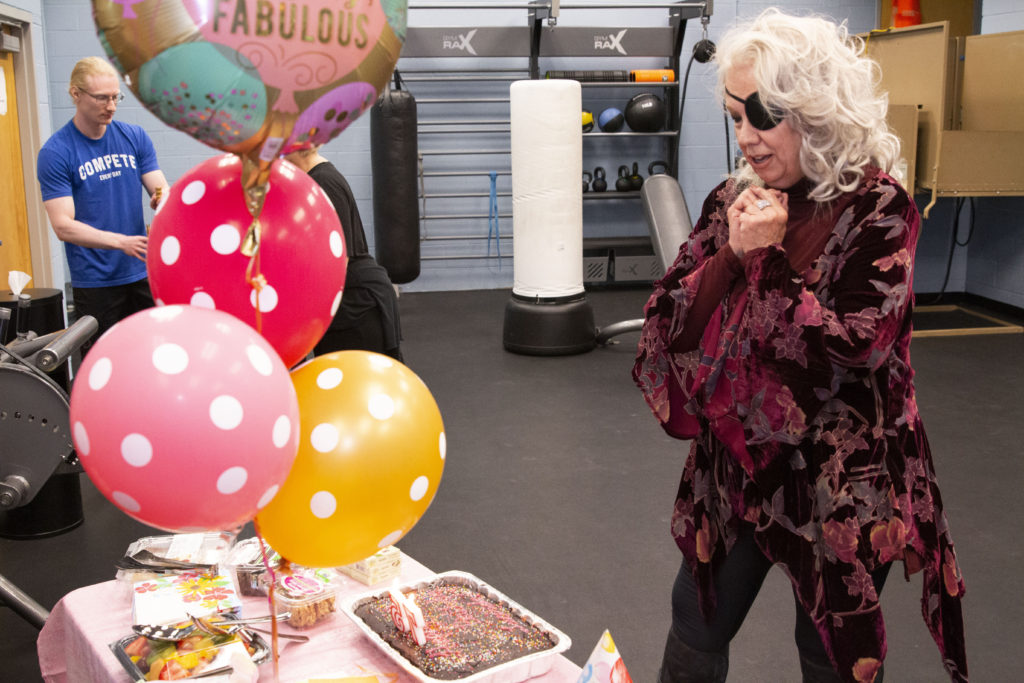 Lucinda Riley blowing out her candles.