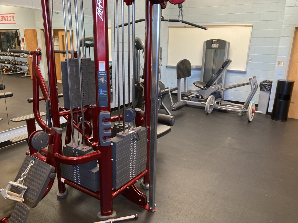 Cable machines, free weights, and leg press in room M180.