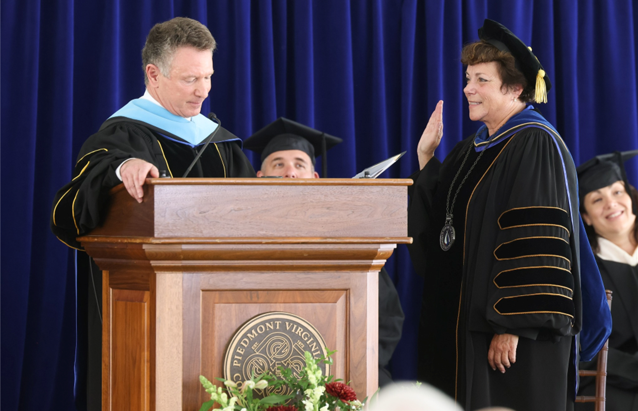 VCCS Chancellor Dr. David Doré swears in PVCC President Dr. Jean Runyon.