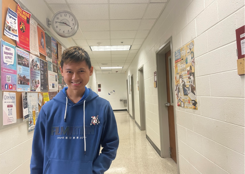 A student (Kritagya) smiles in a PVCC hallway