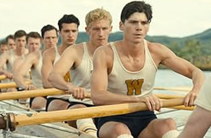 Male college students rowing their crew boat