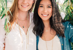 Two women looking into the camera.