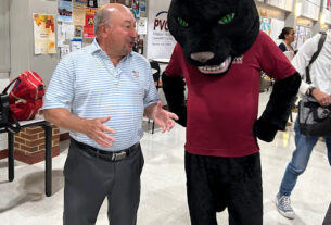 Frank Friedman talking with PVCC mascot