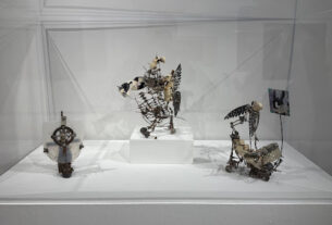 Aggie Zed’s sculptures: three small metal sculptures in a case.