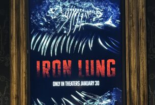 A poster with the words "Iron Lung" in red, surrounded by bones and a large skeleton of an unknown creature.