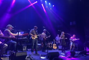 A group of artists perform on stage at the Jefferson Theater