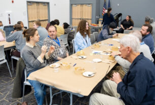 A group of PVCC students, staff, and faculty conversing at The Longest Table event.
