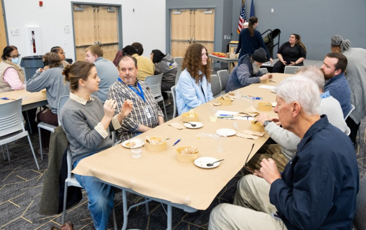 A group of PVCC students, staff, and faculty conversing at The Longest Table event.