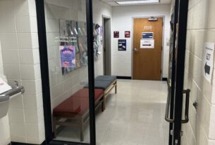 Short hallway in the Main Building leading to the Testing Center and Writing Center, with the Testing Center on the left.