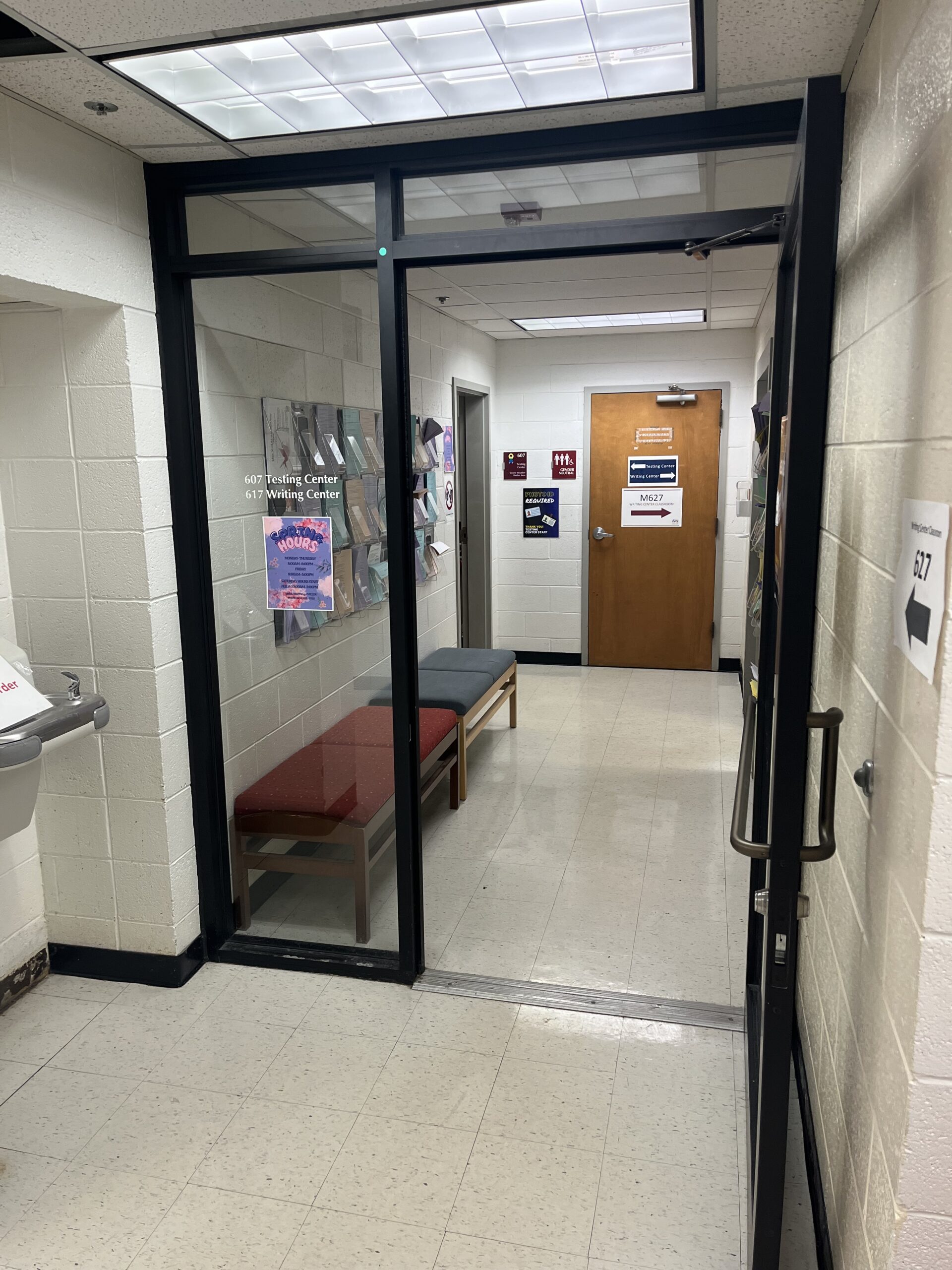 Short hallway in the Main Building leading to the Testing Center and Writing Center, with the Testing Center on the left.