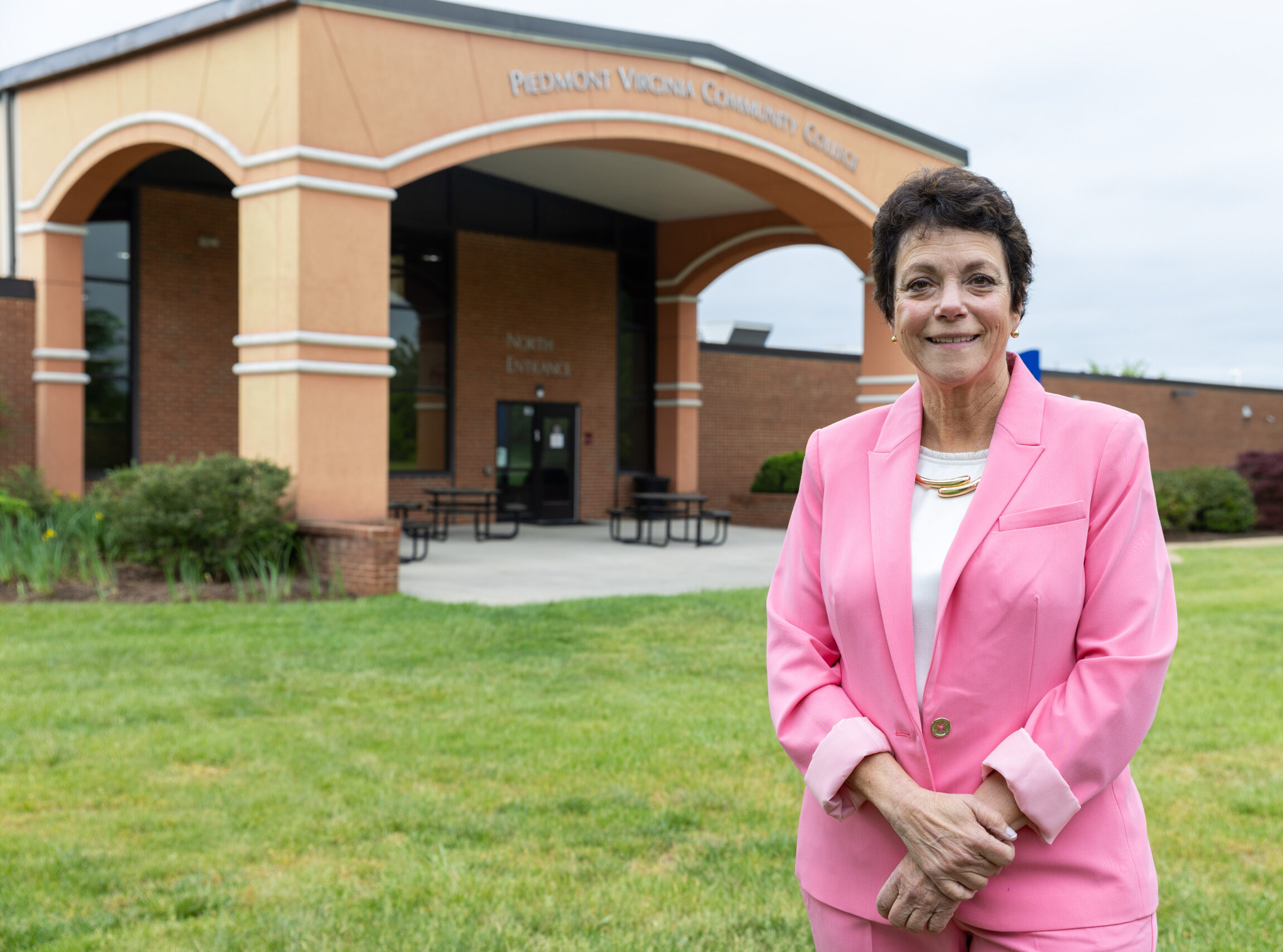 President Dr. Jean Runyon standing in front of PVCC.