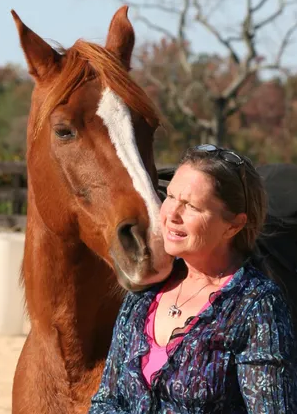 Scooter listening to Pistole as she talks to a group.