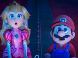 Princess Peach and Mario standing next to each other and staring, slack jawed, up at the sky.