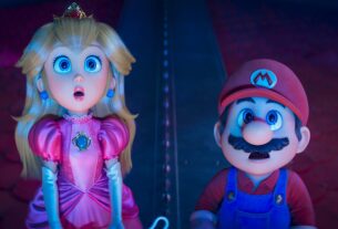 Princess Peach and Mario standing next to each other and staring, slack jawed, up at the sky.