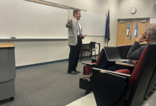 Dr. Sofka delivering his lecture in the auditorium in the main building.